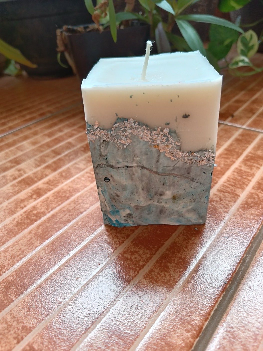 Modern concrete candle with a smooth finish, made in the Concrete & Stone Candle Masterclass